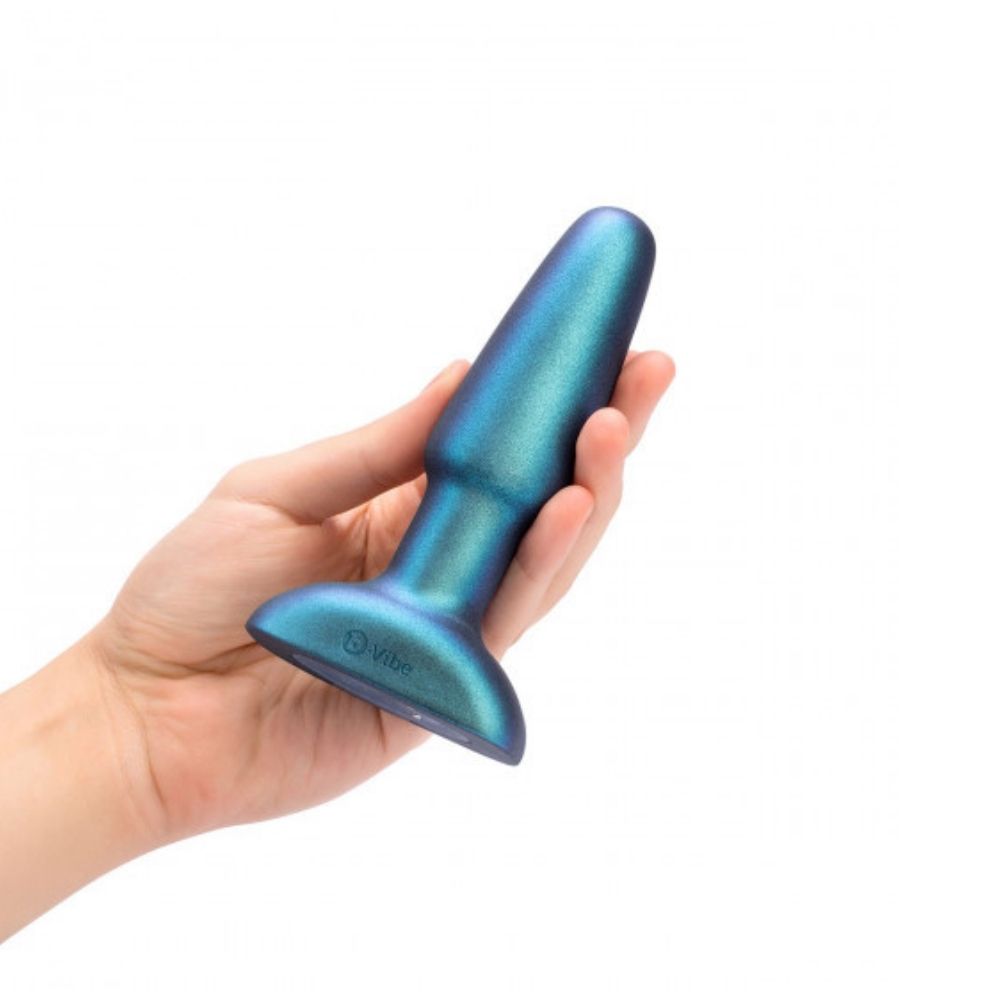 B-Vibe Rimming Plug 2 - Limited Edition Space Green being held in hand