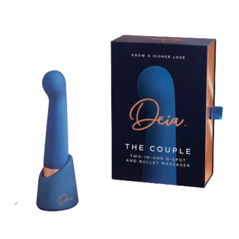 The Couple by Deia inside its display stand in front of the box it comes in