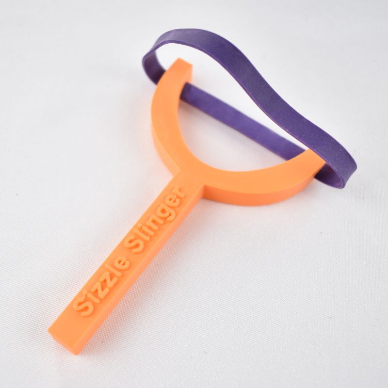 Sizzle Slinger Rubber Band Impact Play Toy