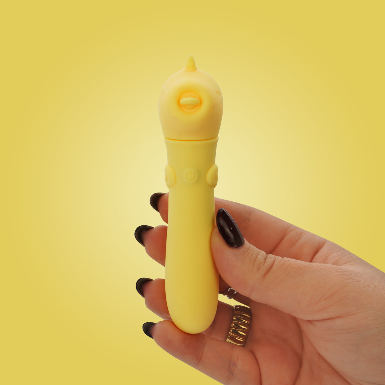 hand holding Unihorn USB Bullet yellow