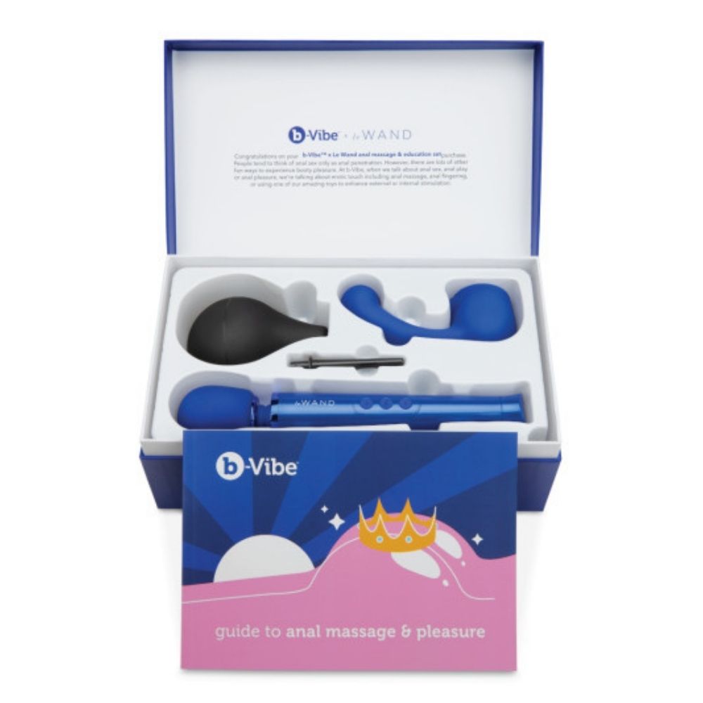 B-Vibe Anal Massage & Education Set with the box opened showing the products inside with the user guide leaning against the box