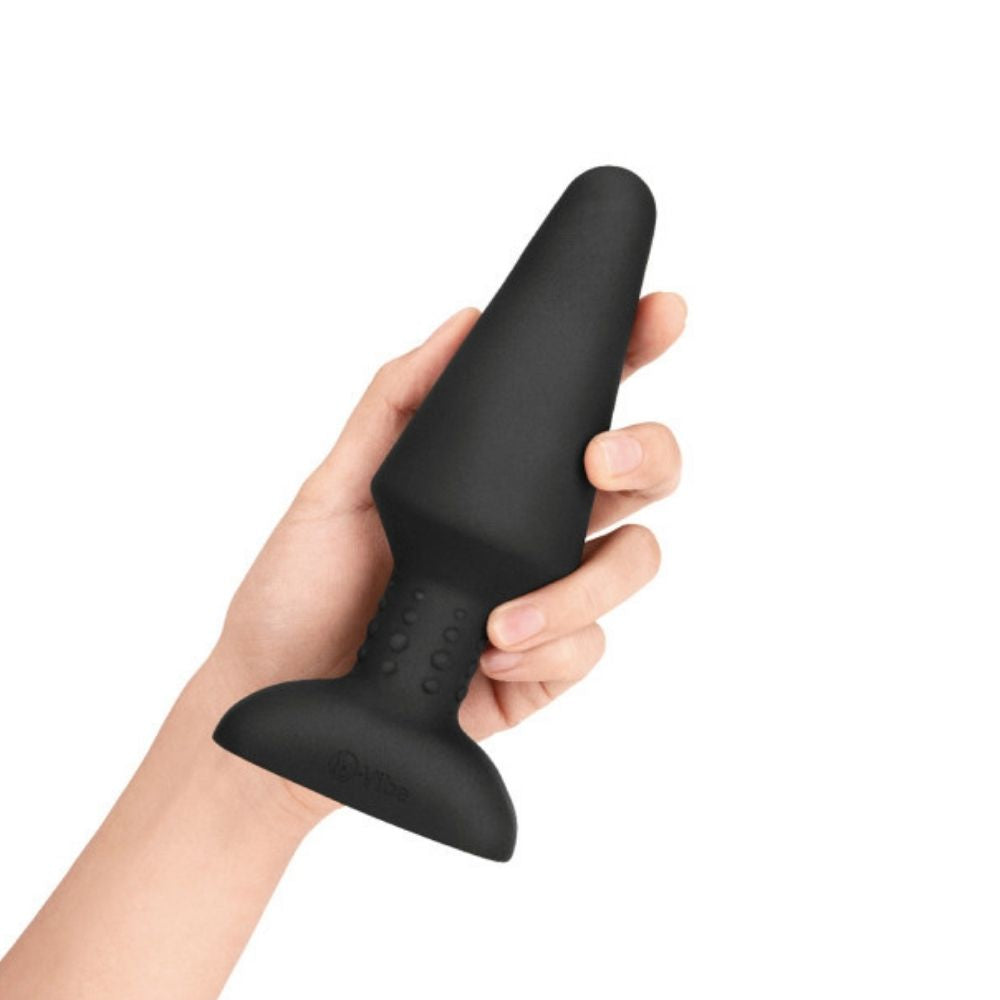 B-Vibe Rimming Plug XL being held in hand