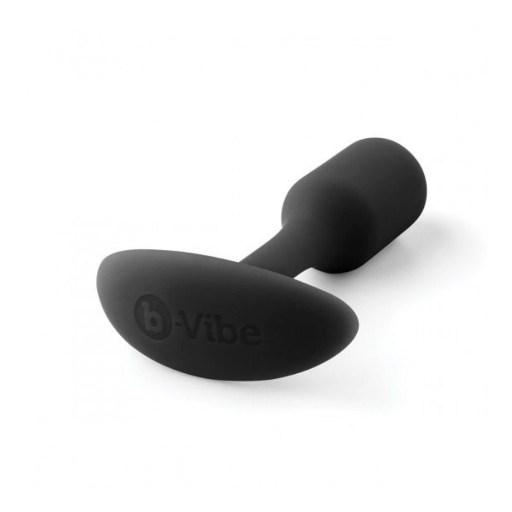 Black B-Vibe Snug Plug 1 (S) laying flat on its side with the base in the forefront