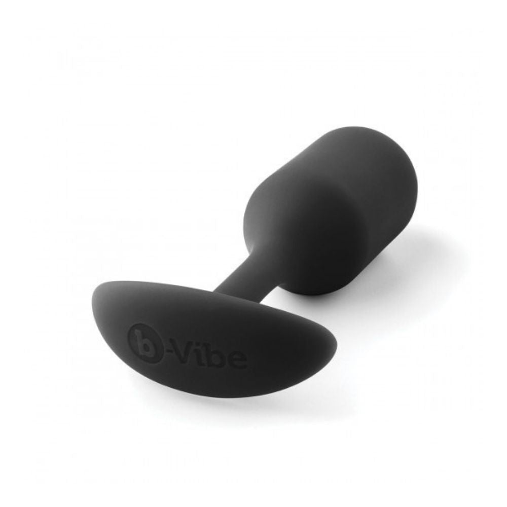 Black B-Vibe Snug Plug 2 (M) laying flat on its side with the base in the forefront