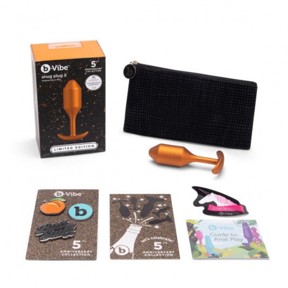 B-Vibe Snug Plug 2 (M) - Limited Edition Sunburst Orange box and its contents: the plug, travel bag, pins and user guide