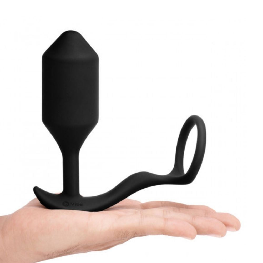 XL B-Vibe Vibrating Snug & Tug placed on the palm of a hand