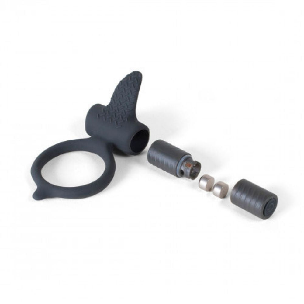 B Swish Bcharmed Classic Ring in black, with the vibrating part removed from the ring and opened to show the batteries