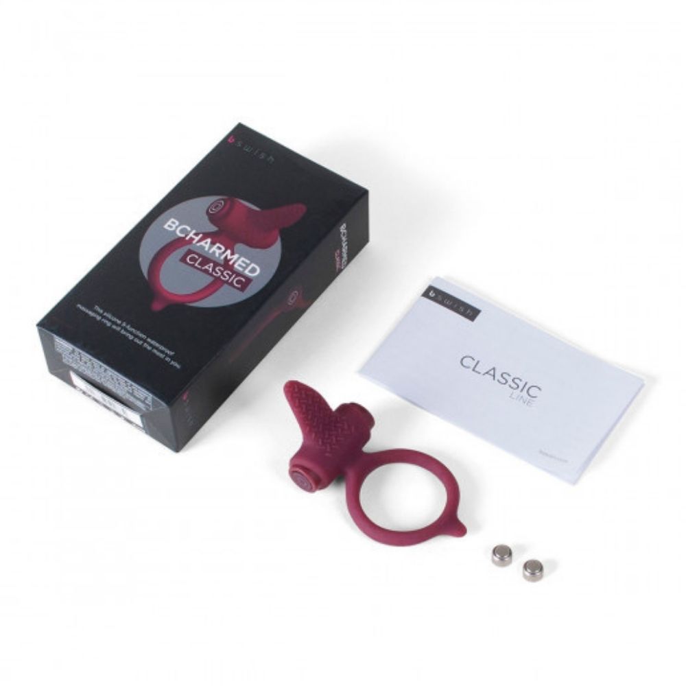 B Swish Bcharmed Classic Ring showing the box it comes in and all the contents, being the ring, batteries, and a user manual