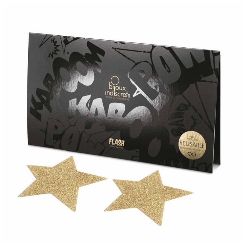 Gold star Bijoux Indiscrets Flash Pasties in front of the box they come in 