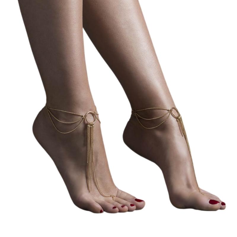 Gold Bijoux Indiscrets Magnifique Feet Chain worn on bare feet