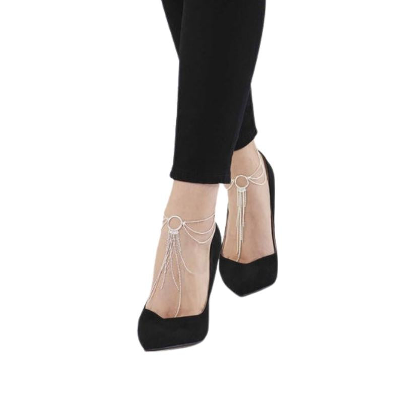 Silver Bijoux Indiscrets Magnifique Feet Chain worn on feet with black high heels