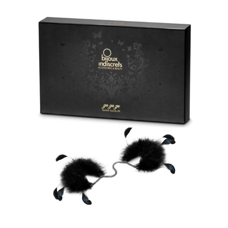 Bijoux Indiscrets Za Za Zu Feather Cuffs in front of the box they come in 