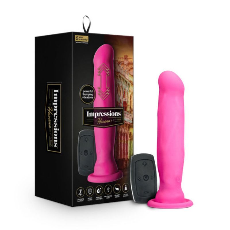 Impressions Havana Pink in front of the box it comes in, standing upright on its base beside the remote control it comes with