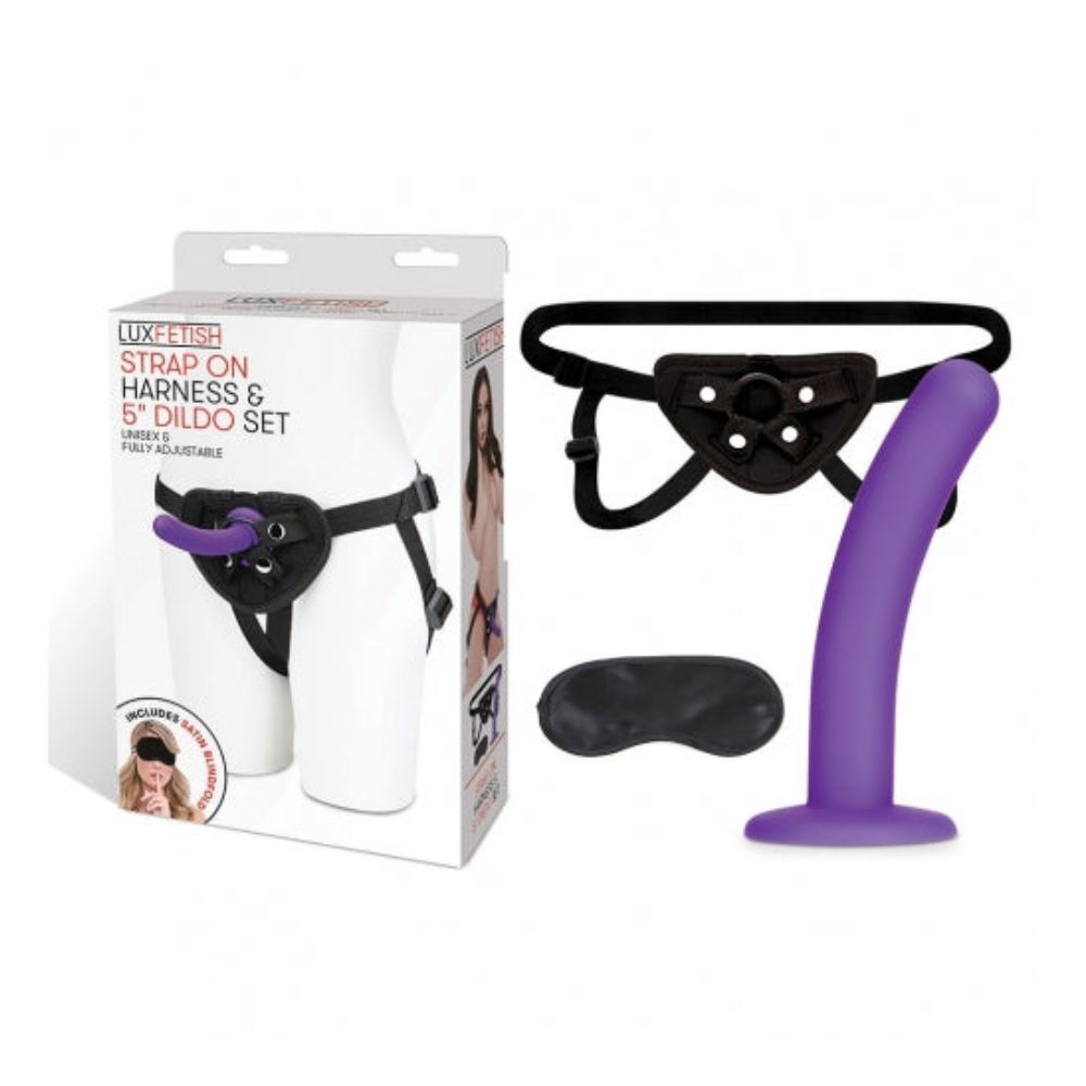 Lux Fetish Strap-On Harness 5 in. Dildo Set including the blindfold, harness and dildo, beside the box they come in