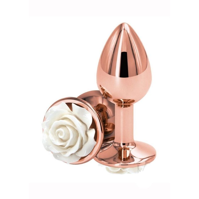 Two Medium Rear Assets Rose Anal Plugs with a white rose base and rose gold colored body. One positioned on side showing the white rose base, the other standing upright on base