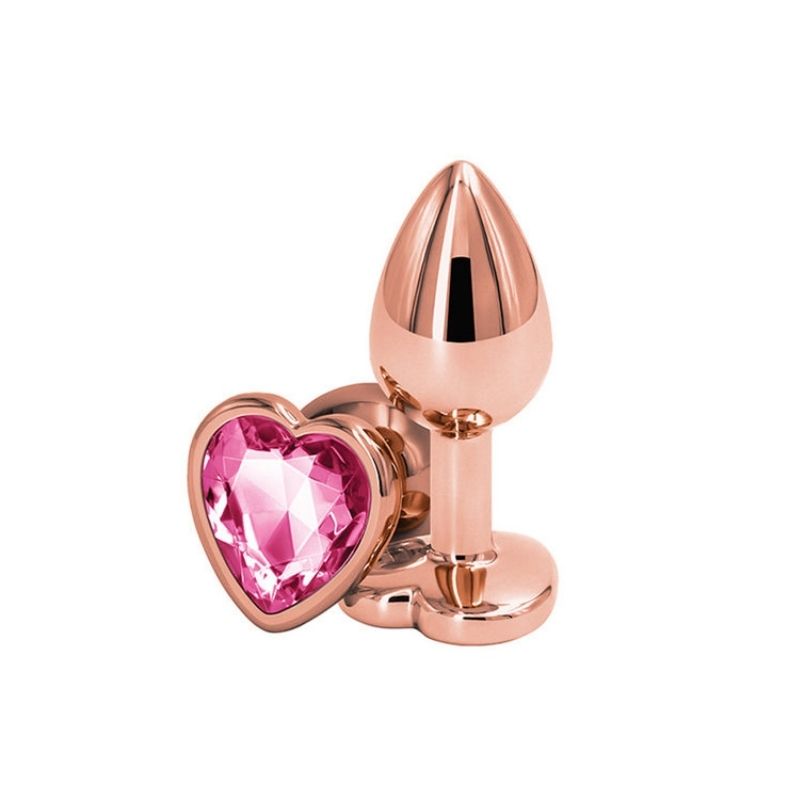2 Rear Assets Rose Gold Heart Medium Pink plugs, one positioned on side showing the pink heart base, the other standing upright on base