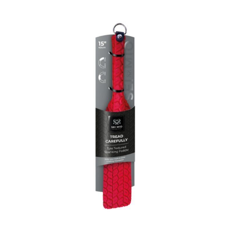 Red Sei Mio Tyre Paddle in its packaging showing its textured side