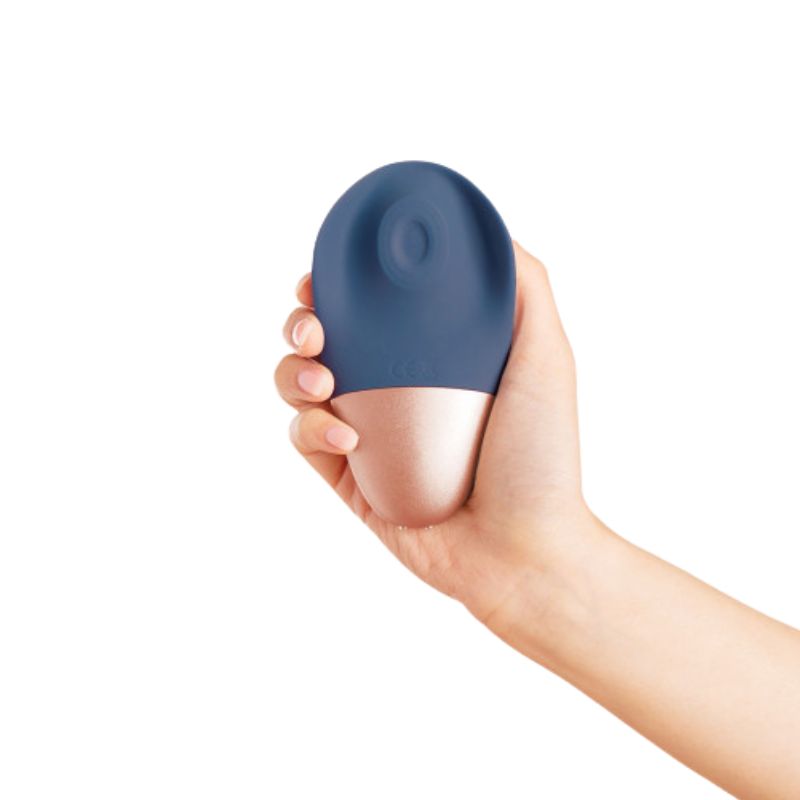 The Arouser by Deia held in hand showing the stimulating tip