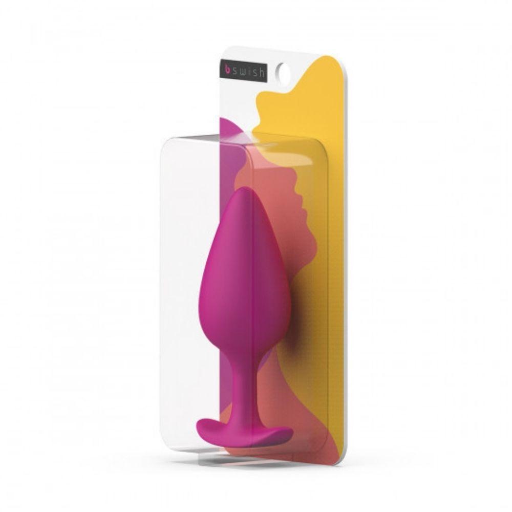 B Swish Bfilled Basic PLUS Plug inside its packaging, standing upright
