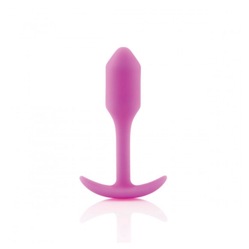 Fuchsia B-Vibe Snug Plug 1 (S) standing upright on its base