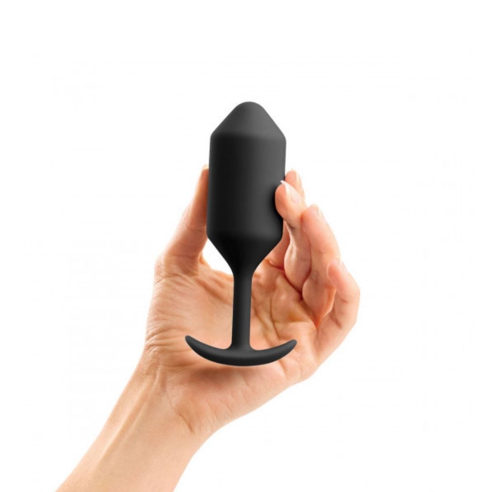 Black B-Vibe Snug Plug 3 (L) being held in hand