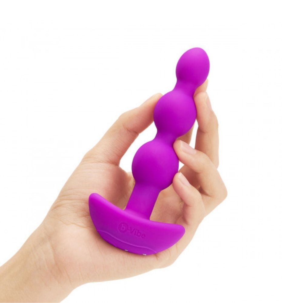 B-Vibe Triplet Beads being held in hand