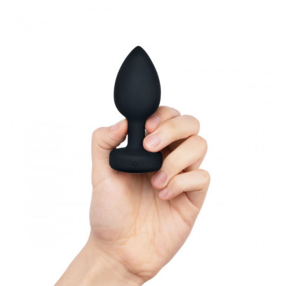 Black B-Vibe Vibrating Jewel Plug Medium/Large being held in hand