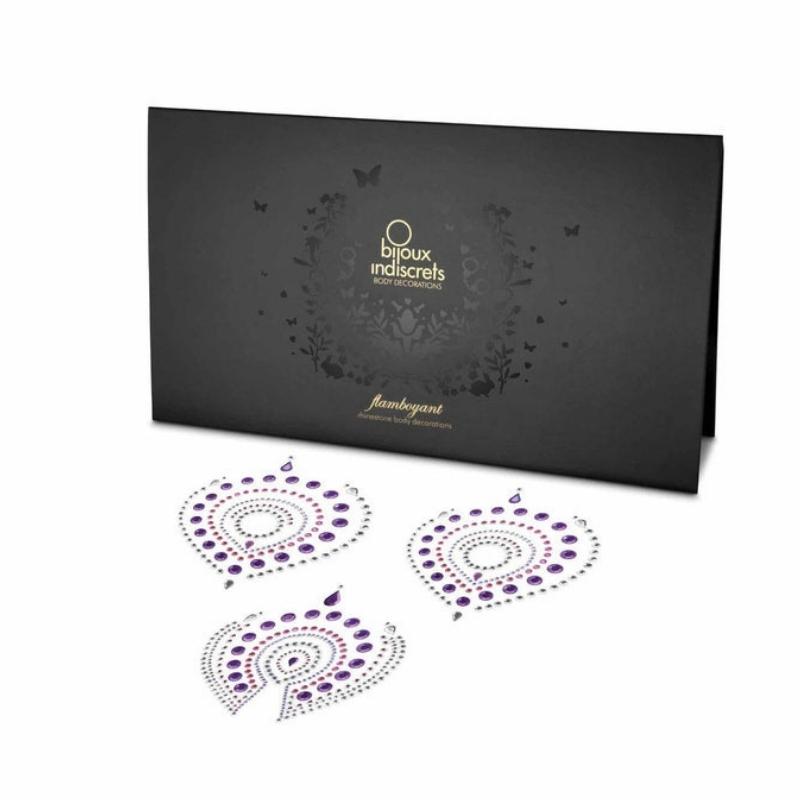 Bijoux Indiscrets Flamboyant in purple and pink beside the box they come in