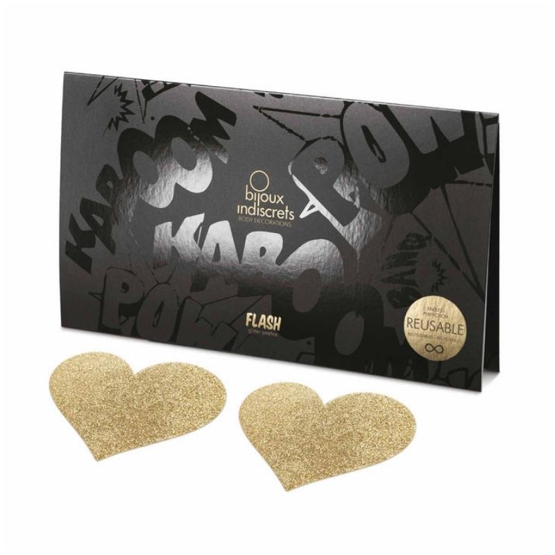 Gold heart Bijoux Indiscrets Flash Pasties in front of the box they come in 
