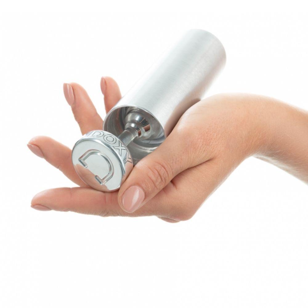 Doxy Ribbed Plug being held inside storage case