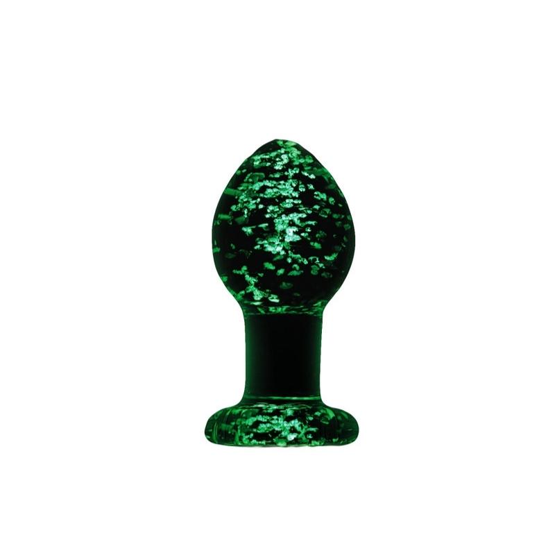 Medium glow in the dark Firefly Glass Plug standing on base