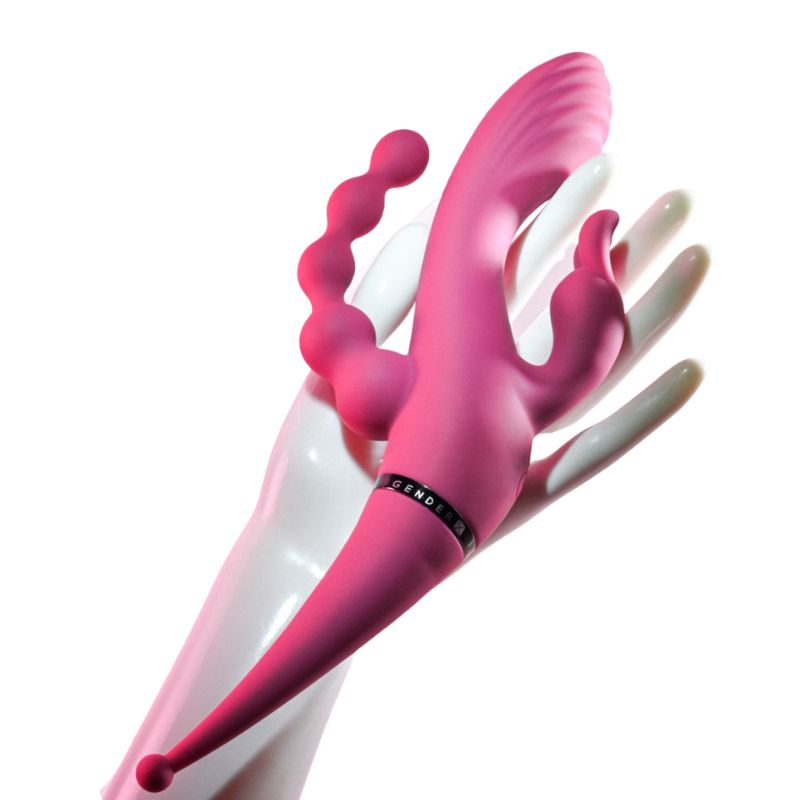 The Gender X Four By Four Multi Stimulator held in hand.