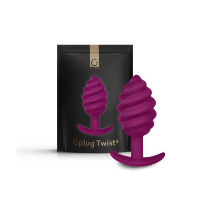 Gvibe Gplug Twist 2 shown standing upright on its base in front of the packaging it comes in