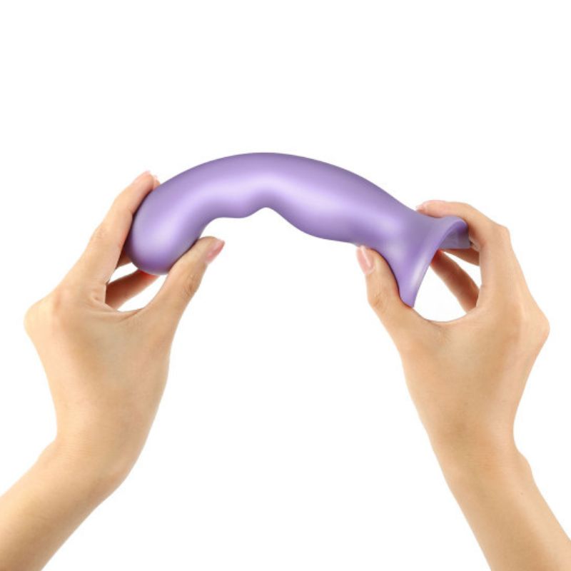 Strap-On-Me P&G Plug being bent while held in hands